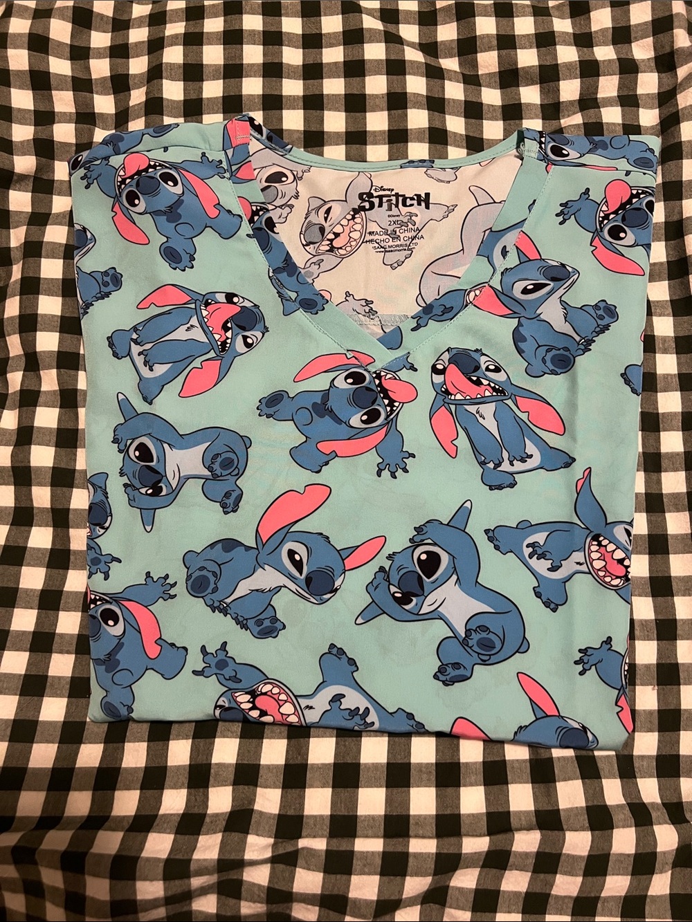 Disney Light Blue Stitch scrub Top with Pink Ear Accents